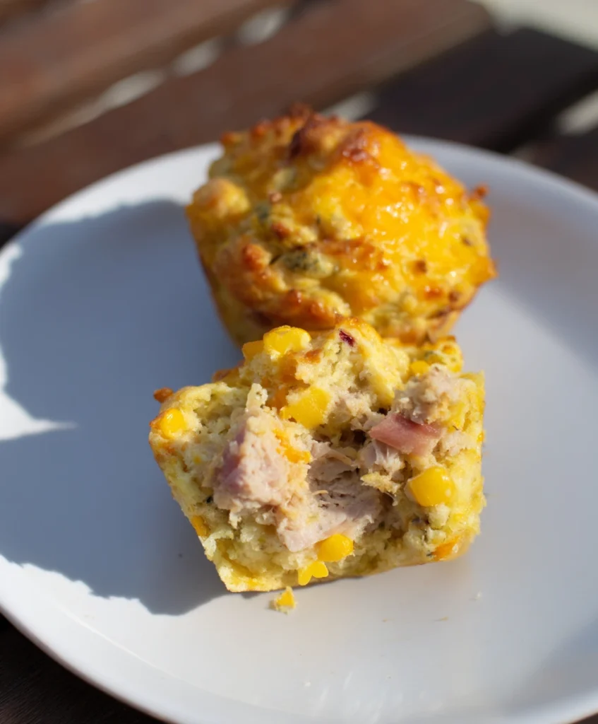 High Protein Savory Muffins with Turkey & Cheddar on a wooden board