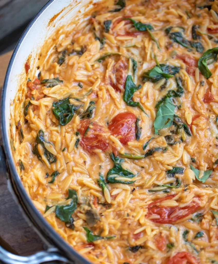 Creamy Tomato and Spinach Orzo Pasta Bake with Burst Cherry Tomatoes